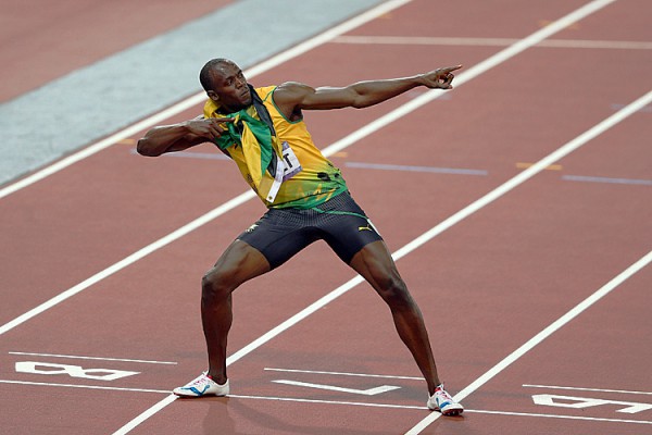 LONDON, ENGLAND - AUGUST 09:  Usain Bolt of Jamaica celebrates after winning gold in the Men's 200m Final on Day 13 of the London 2012 Olympic Games at Olympic Stadium on August 9, 2012 in London, England.  (Photo by Clive Brunskill/Getty Images)